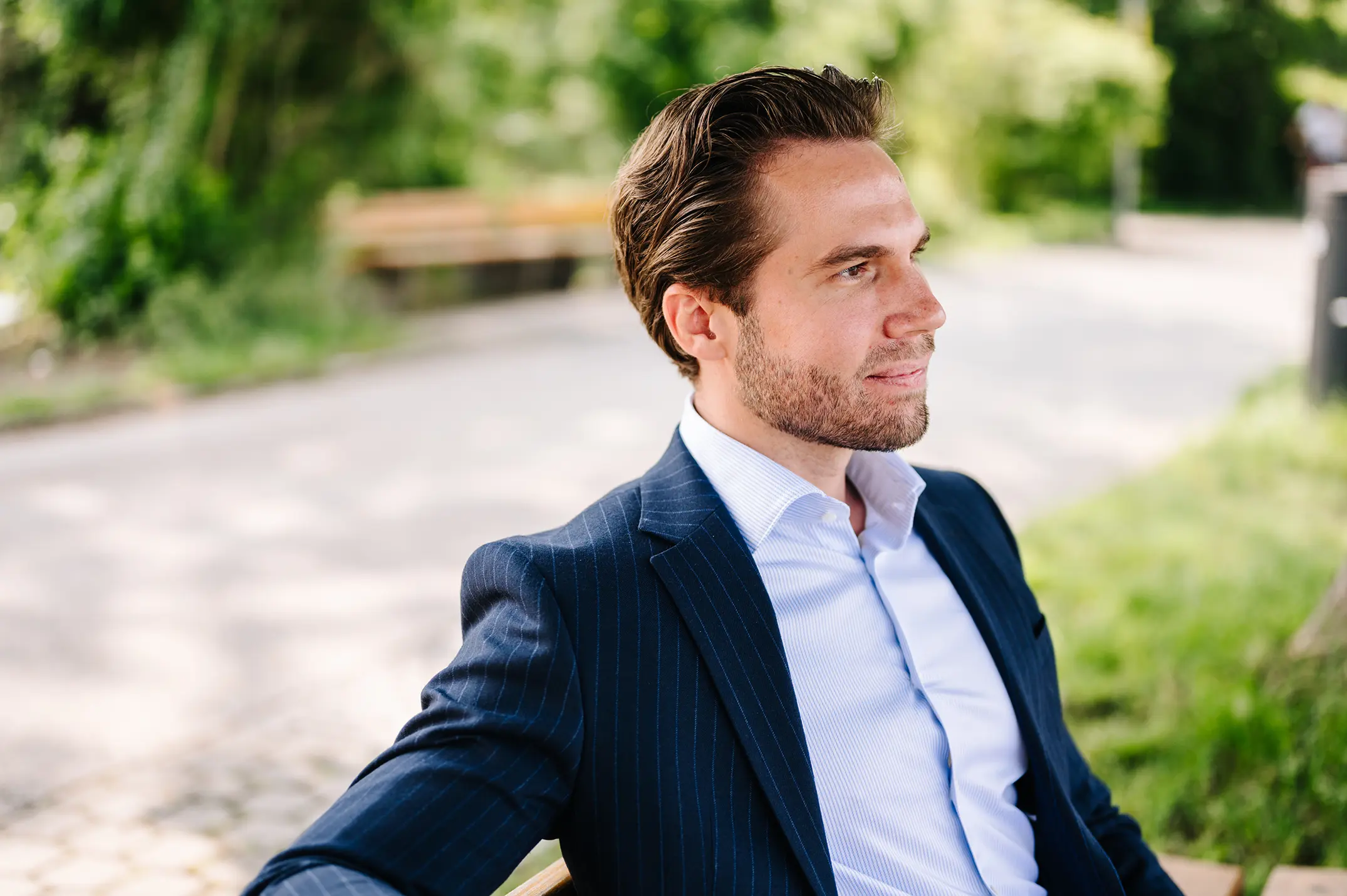 immostark - Florian Stark auf einem Portraitfoto. Startseite der Website.